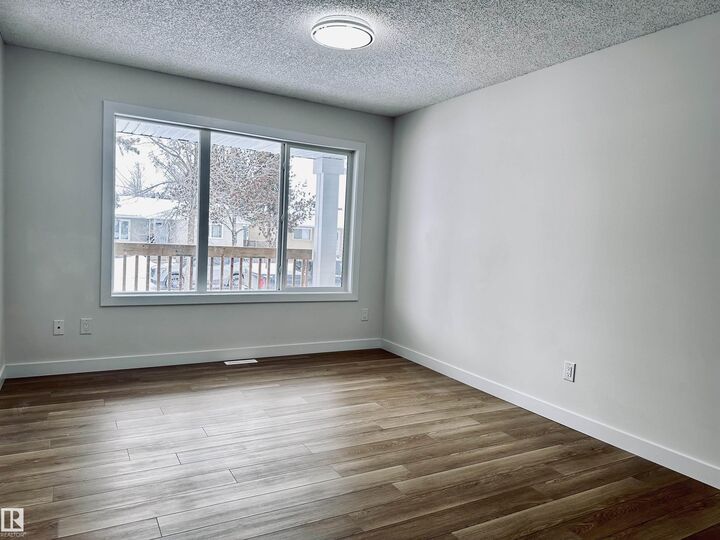 Property Photo:  4843 115 Avenue NW  AB T5W 0W3 