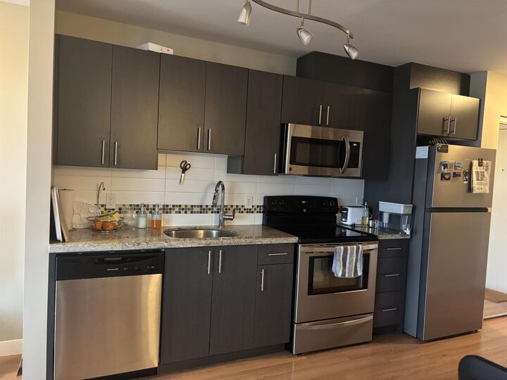 Property Photo: 7738 Edmonds Street 305 BC V3N 1B8