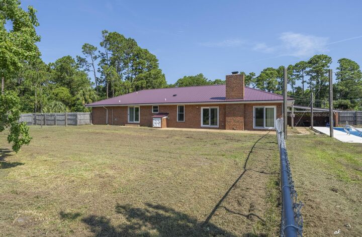 Property Photo: 8211 Laird Street FL 32408