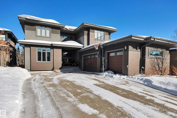 Property Photo: 699 Howatt Drive SW AB T6W 3K3
