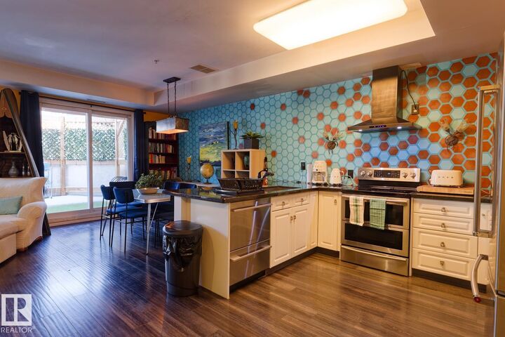 Property Photo:  10728 82 Avenue NW 115  AB T6E 6P5 