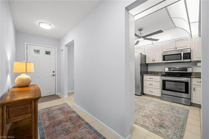 Property Photo:  500 Misty Pines Cir 2-103  FL 34105 