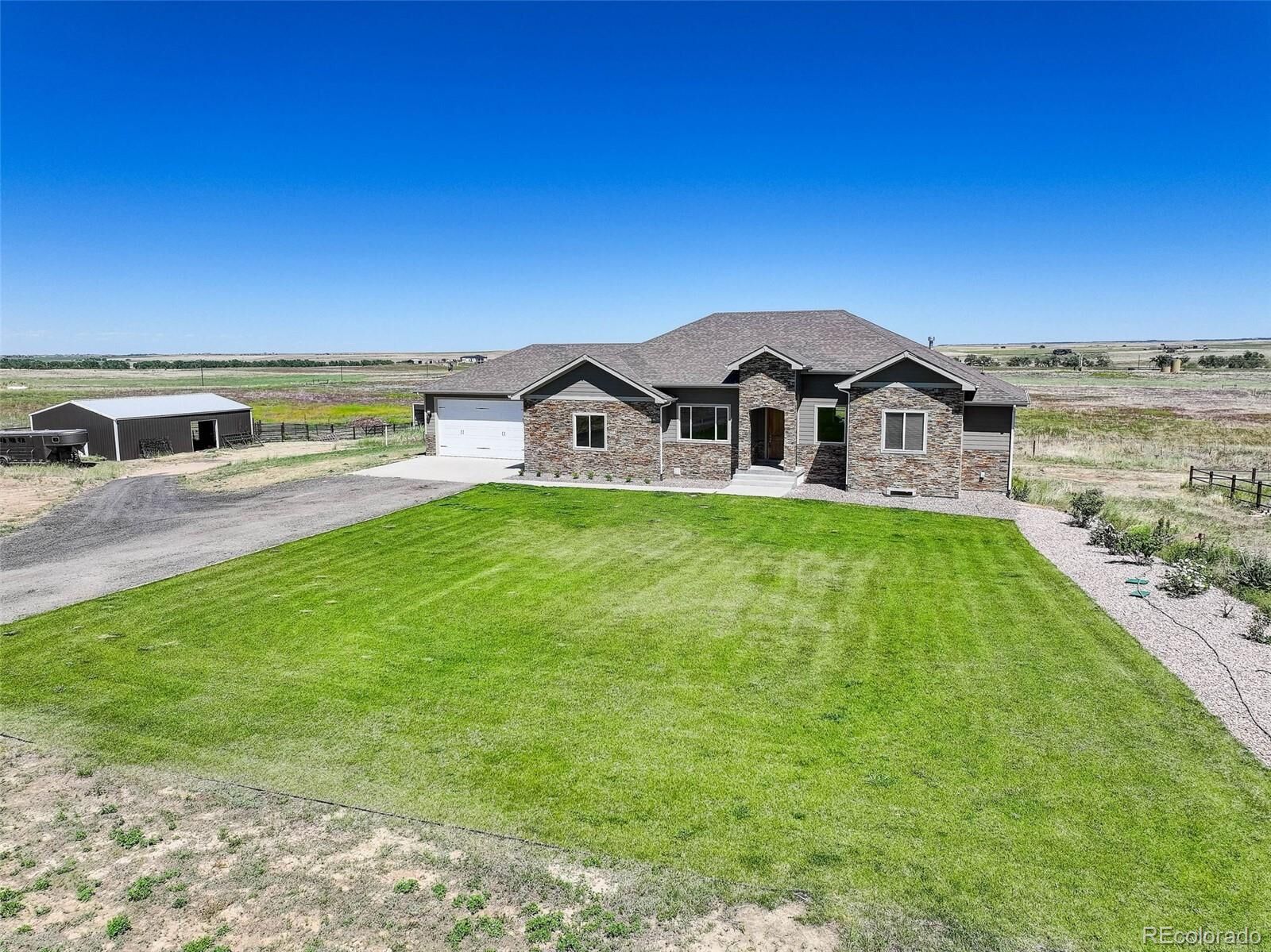 Property Photo: 45425 Wolf Creek Drive CO 80102