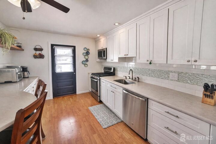 Property Photo:  100 Pinetree Drive  NJ 08859 