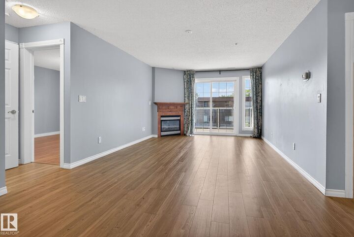 Property Photo:  12110 106 Avenue NW 314  AB T5H 4R9 