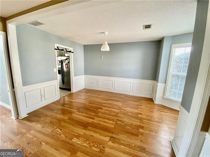 Property Photo:  9020 Friarbridge Drive  GA 30024 