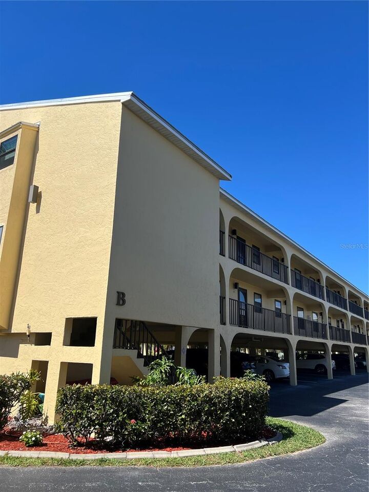 Property Photo:  14459 River Beach Drive B-210  FL 33953 