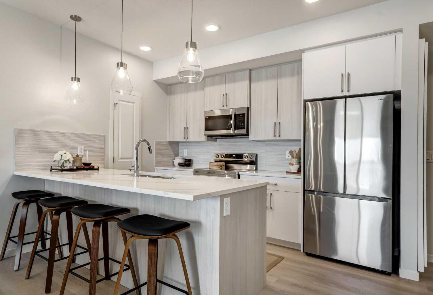 Property Photo: 20295 Seton Way SE 2111 AB T3M 3Y9