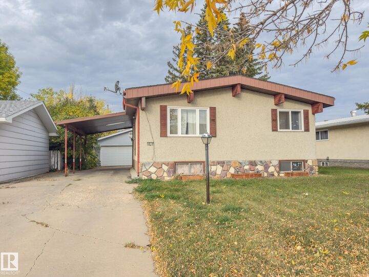 Property Photo:  4814 53 Street  AB T9N 1X8 