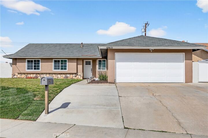 Property Photo:  12671 Hollyglen  CA 92503 