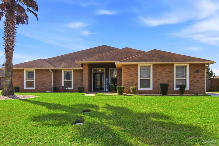 Property Photo: 5808 Dunridge Dr FL 32571