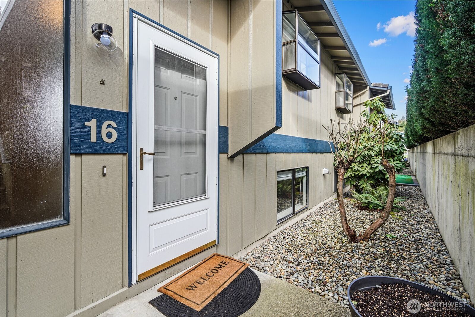 Property Photo: 110 19th Avenue SE 16 WA 98372