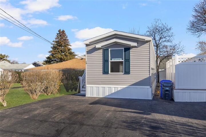 Property Photo:  38 Lowell Avenue  RI 02861 