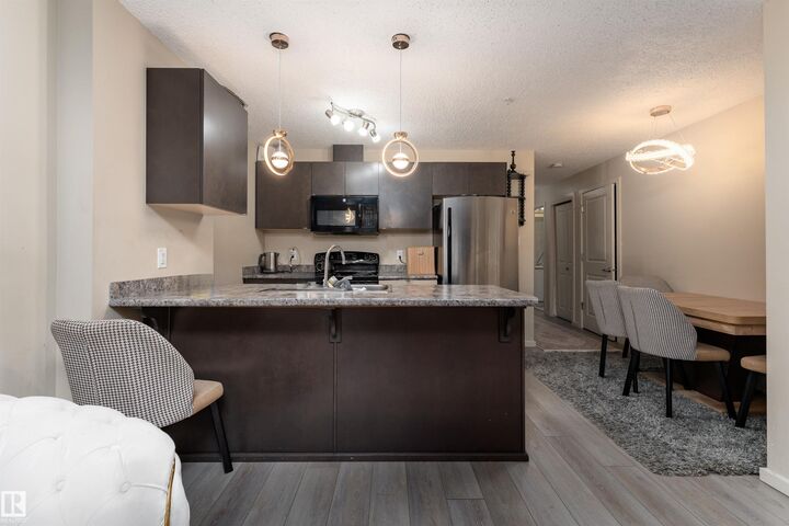 Property Photo: 340 Windermere Road NW 205 AB T6W 2P2