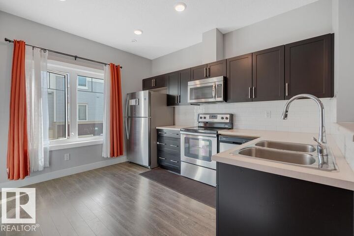 Property Photo:  804 Welsh Drive SW 97  AB T6X 1Y8 