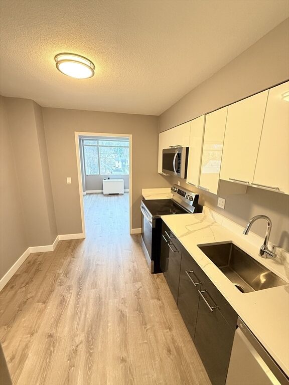 Property Photo:  846 Massachusetts Ave 5D  MA 02476 