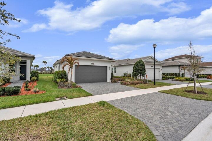 Property Photo: 9399 SW Pepoli Way FL 34987