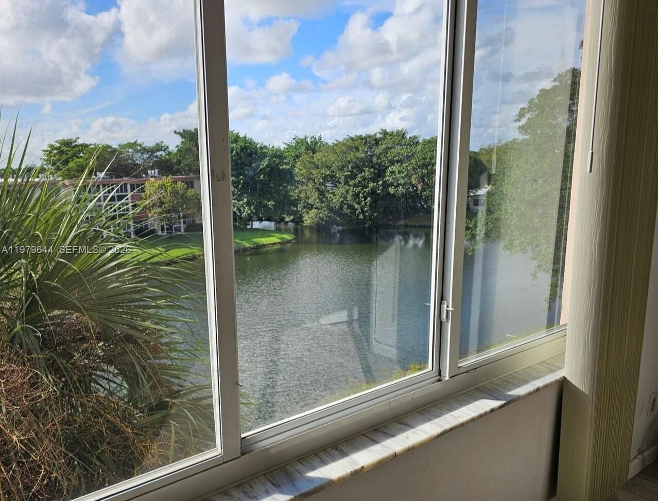 Property Photo:  1103 NW 58th Ter 417  FL 33313 