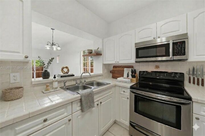 Property Photo:  1166 NW 100th Ave  FL 33024 
