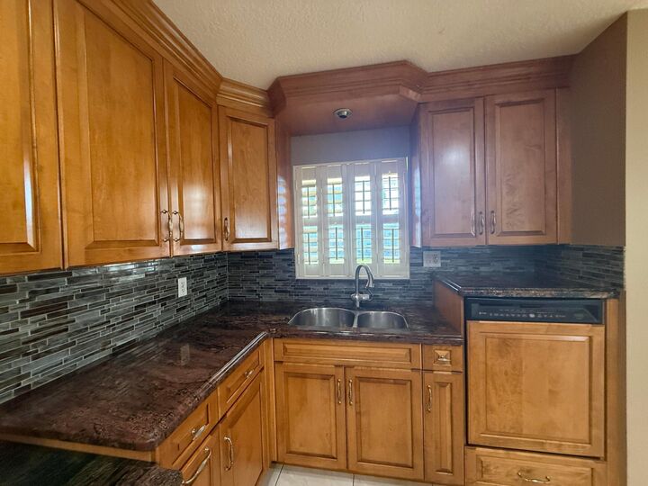 Property Photo:  220 Country Lane A  FL 33435 