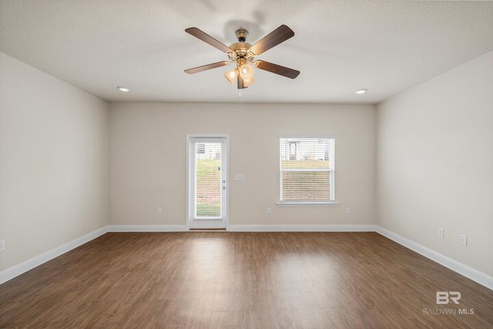 Property Photo:  25806 Pollard Road 65  AL 36526 