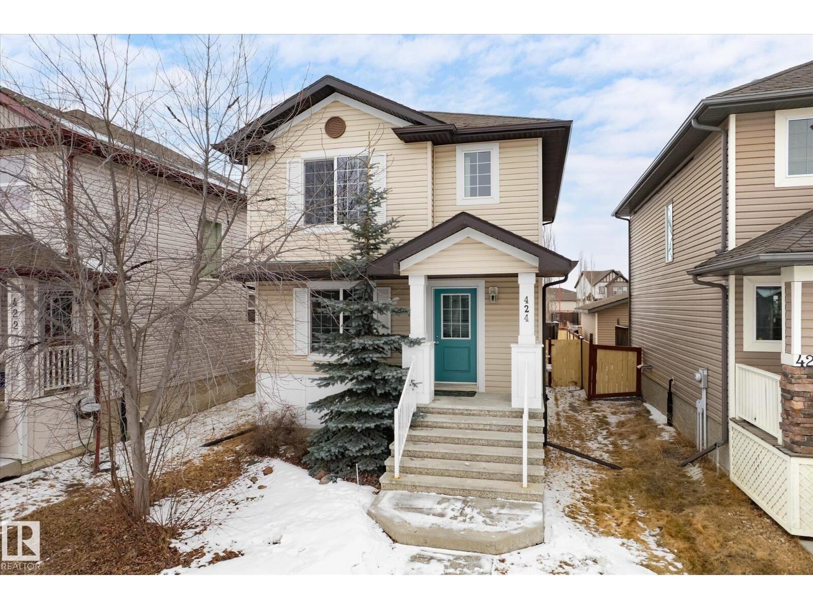 Property Photo: 424 Songhurst Pl AB T9E 0P9