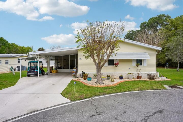 Property Photo:  122 Tamarisk Way  FL 34748 