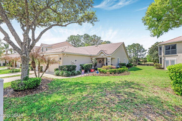 Property Photo: 26 Golf Villa Drive FL 32128