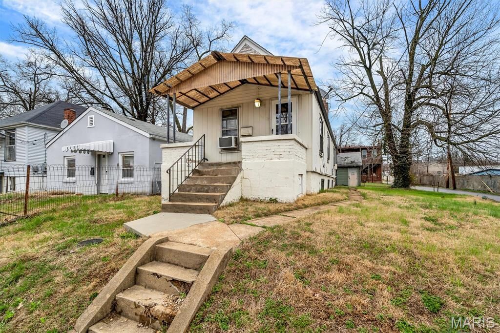 Property Photo:  6401 Jesse Jackson Avenue  MO 63121 