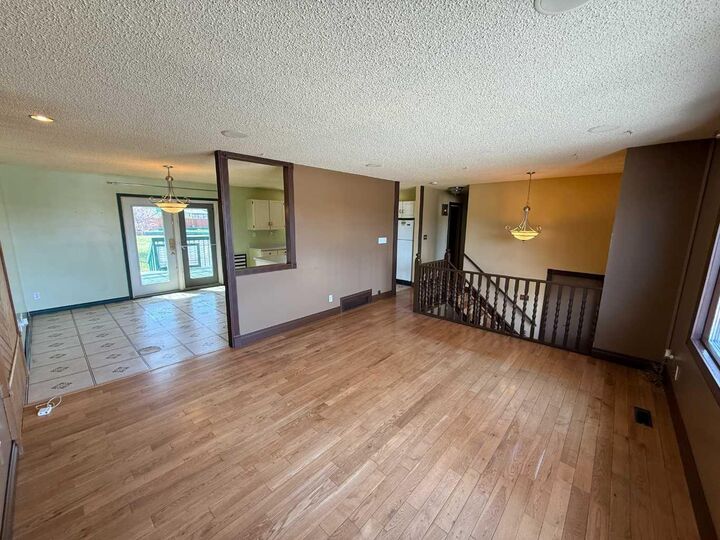 Property Photo: 202 Maligne Drive AB T7V 1J5
