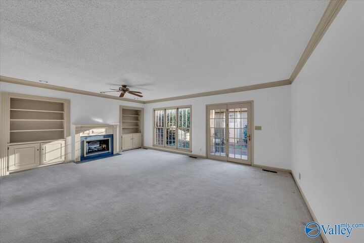 Property Photo: 222 Inverness Drive SW 222 AL 35802