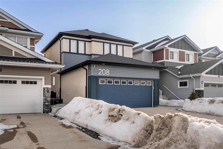 Property Photo:  208 Atlas Crescent  MB R2V 5A8 