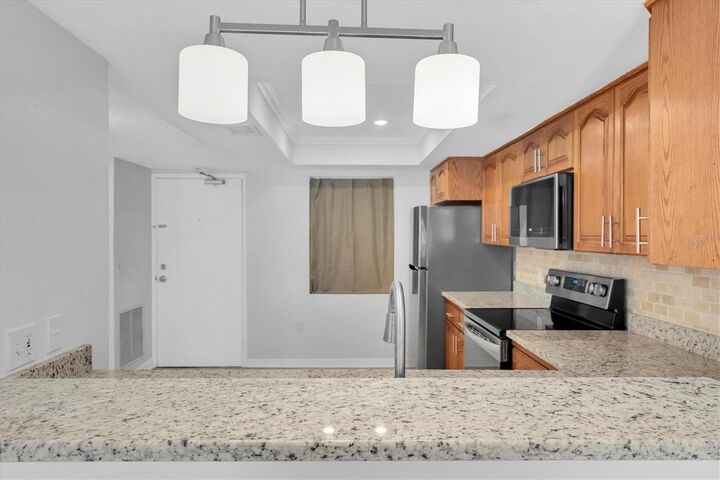 Property Photo:  4902 38th Way S 109  FL 33711 