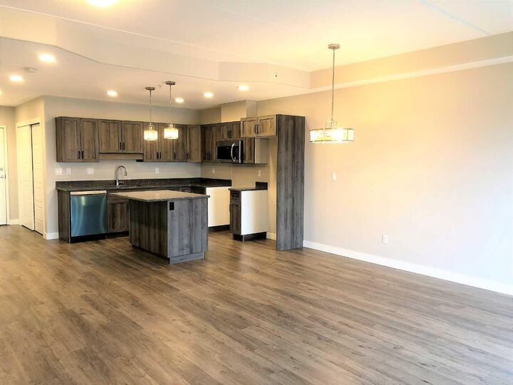 Property Photo: 499B Meadow Lake Court E 205 AB T1R 0Y7