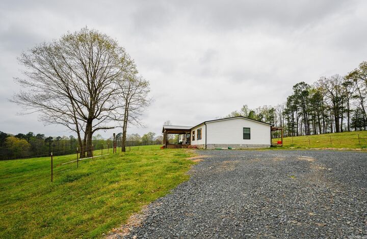Property Photo: 665 Highway 246 AR 71971