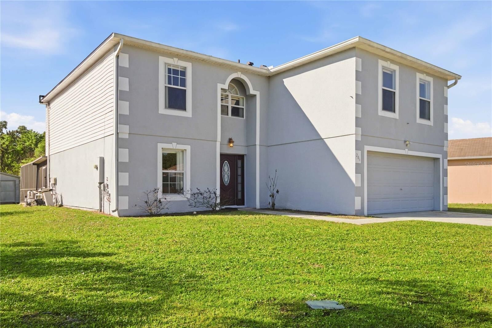 Property Photo:  206 Taranto Way  FL 34758 