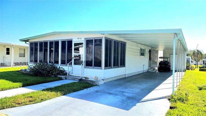 Property Photo:  39820 US Highway 19 N 182  FL 34689 