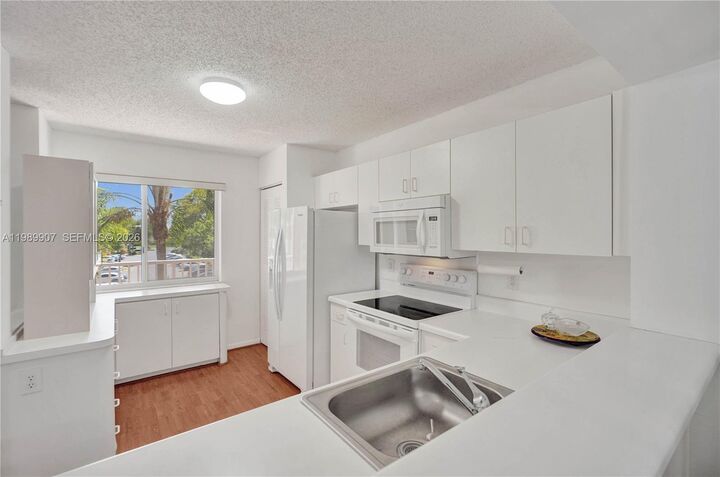 Property Photo:  9511 Weldon Cir G306  FL 33321 