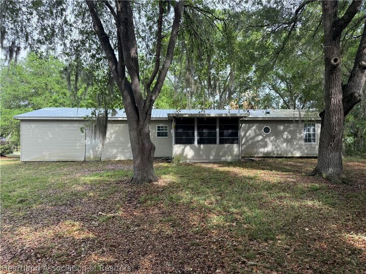 Property Photo:  5719 Wolf Lake Road  FL 33875 