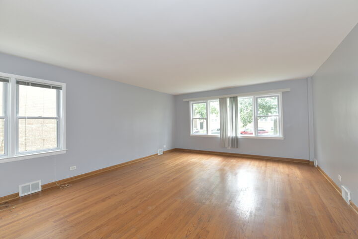 Property Photo:  4914 Louise Street 1  IL 60077 