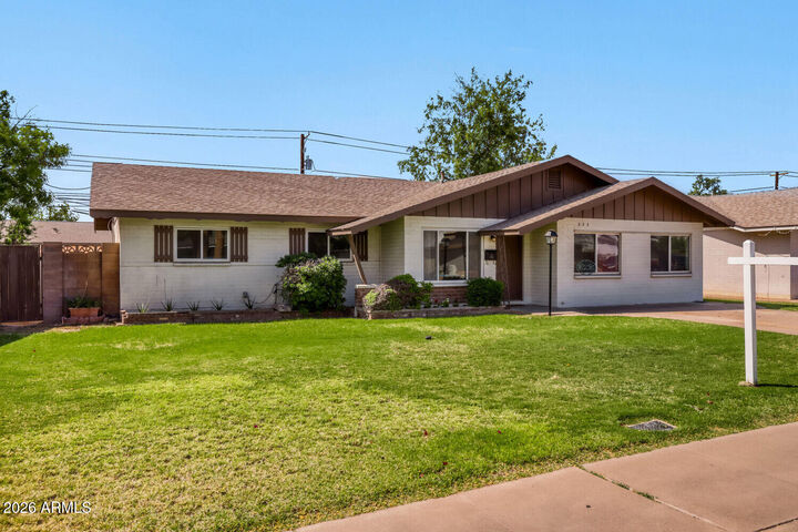 Property Photo: 233 E Cairo Drive AZ 85282