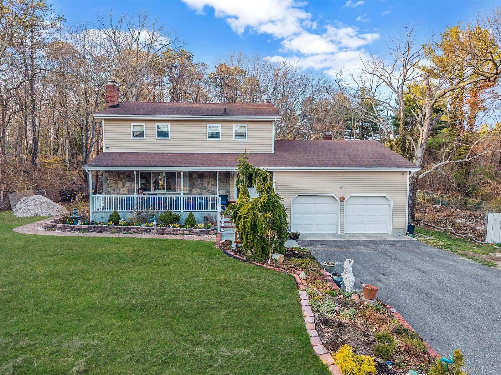 Property Photo: 231 W Woodside Avenue NY 11772