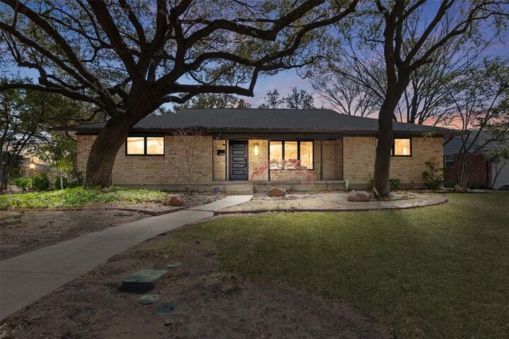 Property Photo: 406 Thompson Drive TX 75080