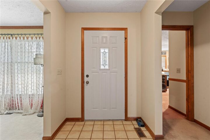 Property Photo: 1323 W State Route 571 OH 45371