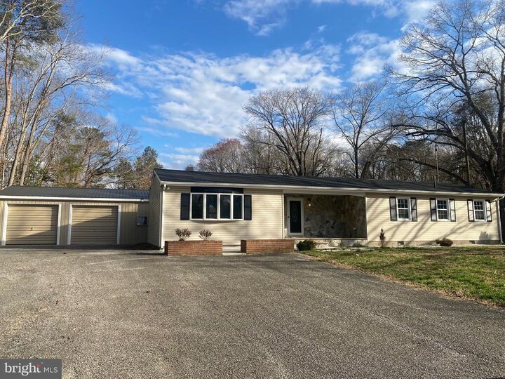 Property Photo:  24247 Old Meadow Road  DE 19973 