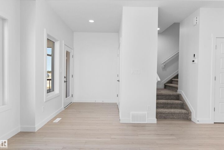 Property Photo: 18713 18A Avenue NW AB T6M 0X8