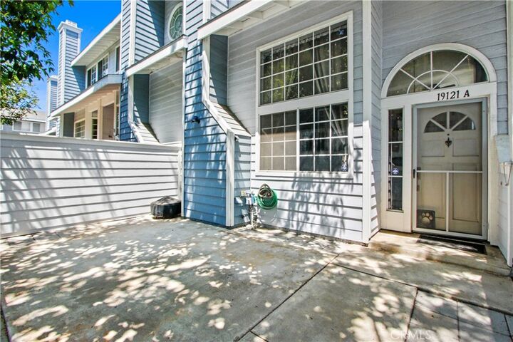 Property Photo:  19121 Queensport A  CA 92646 