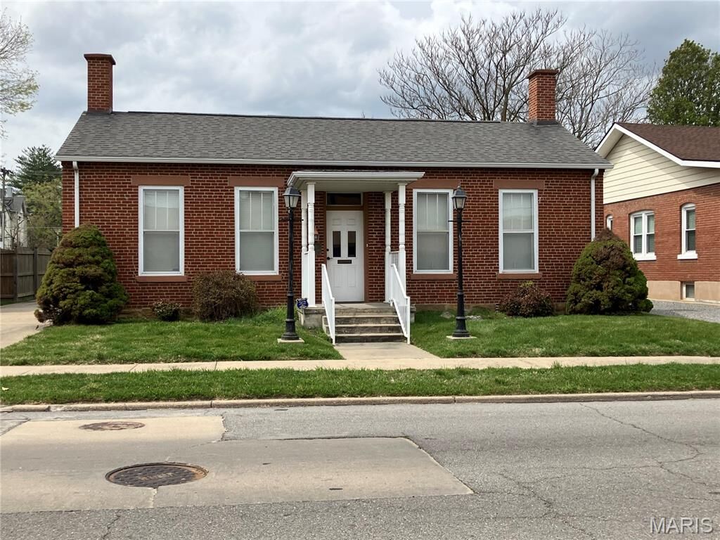 Property Photo:  119 S Spanish Street  MO 63703 