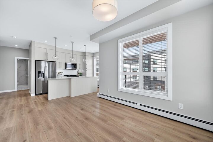 Property Photo: 383 Smith Street NW 325 AB T3B 6J9