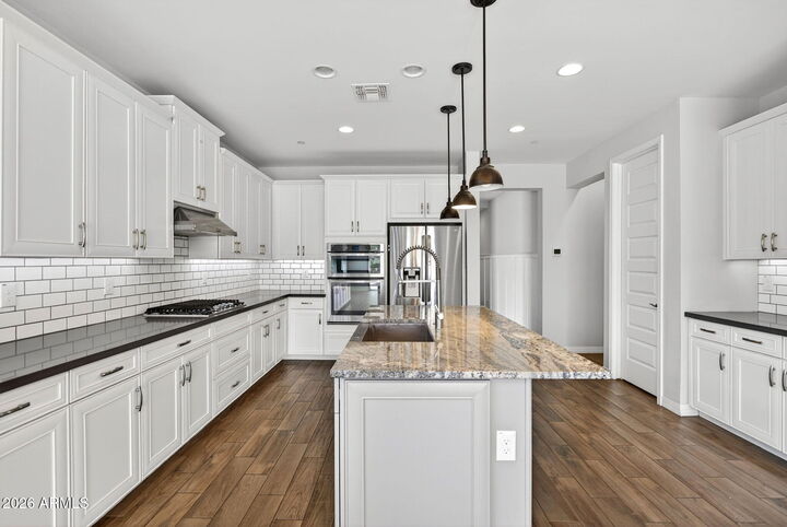 Property Photo:  12124 W Peak View Road  AZ 85383 